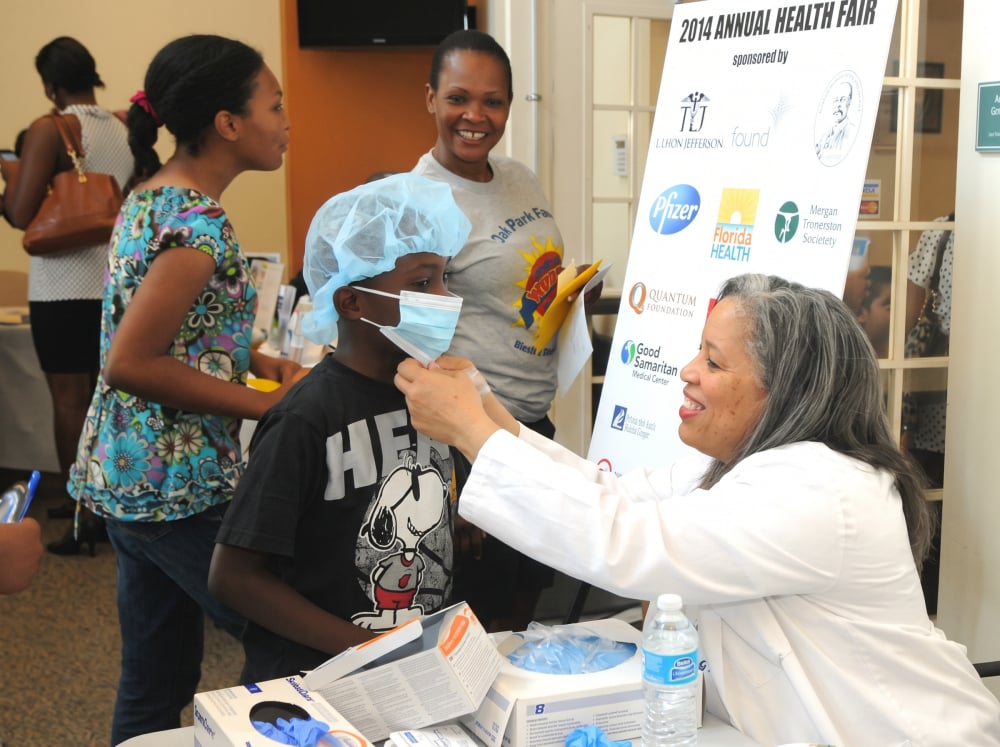 TLJMS annual health fair picture with the young volunteer